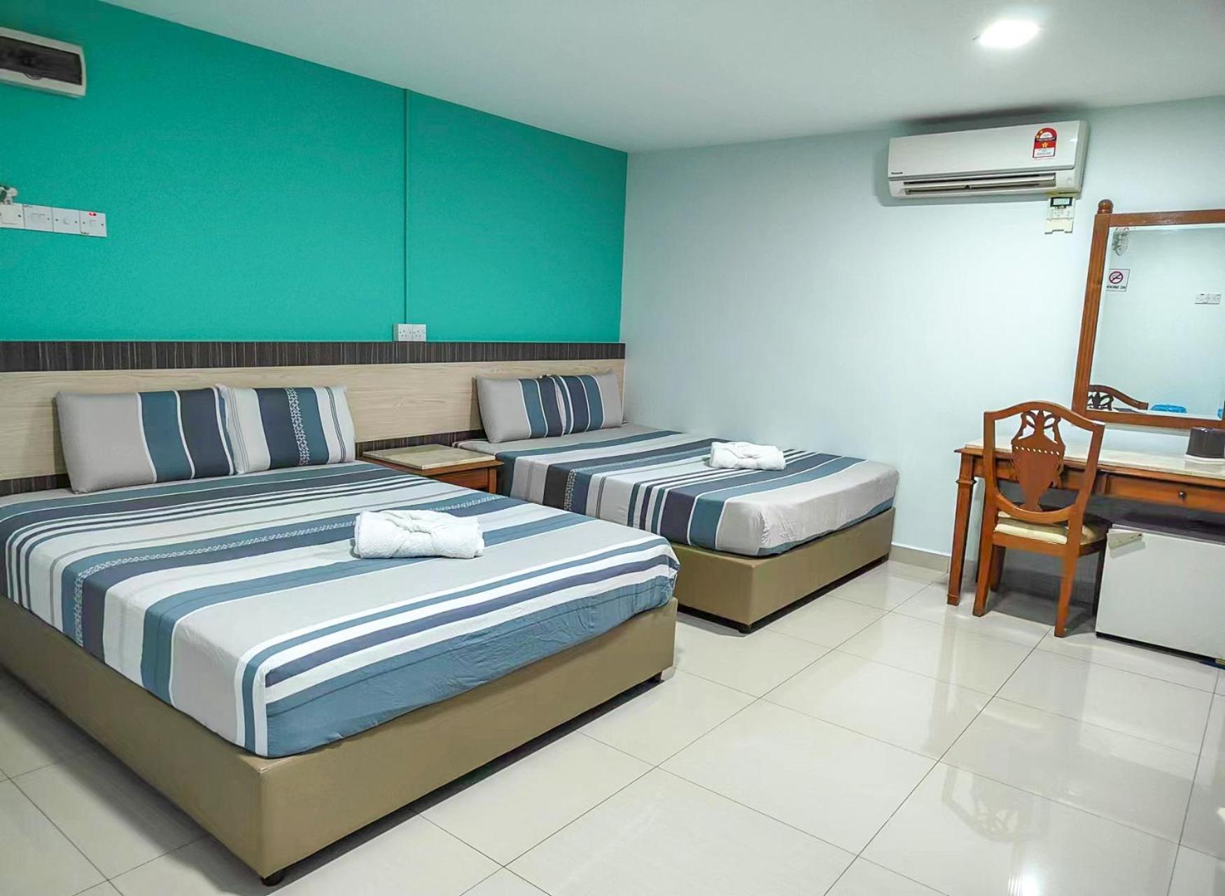 G Star Hotel Pantai Remis Esterno foto