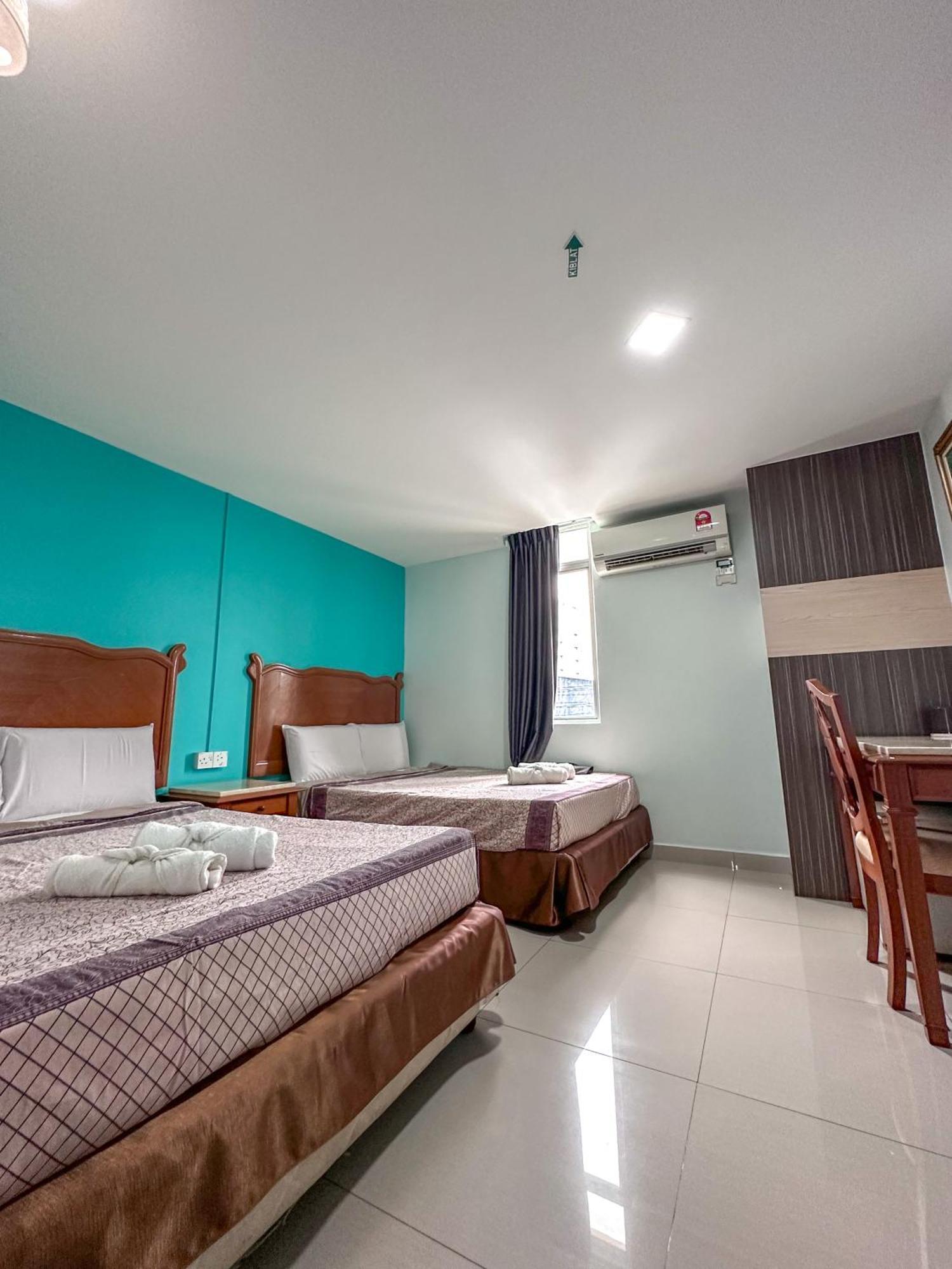 G Star Hotel Pantai Remis Esterno foto