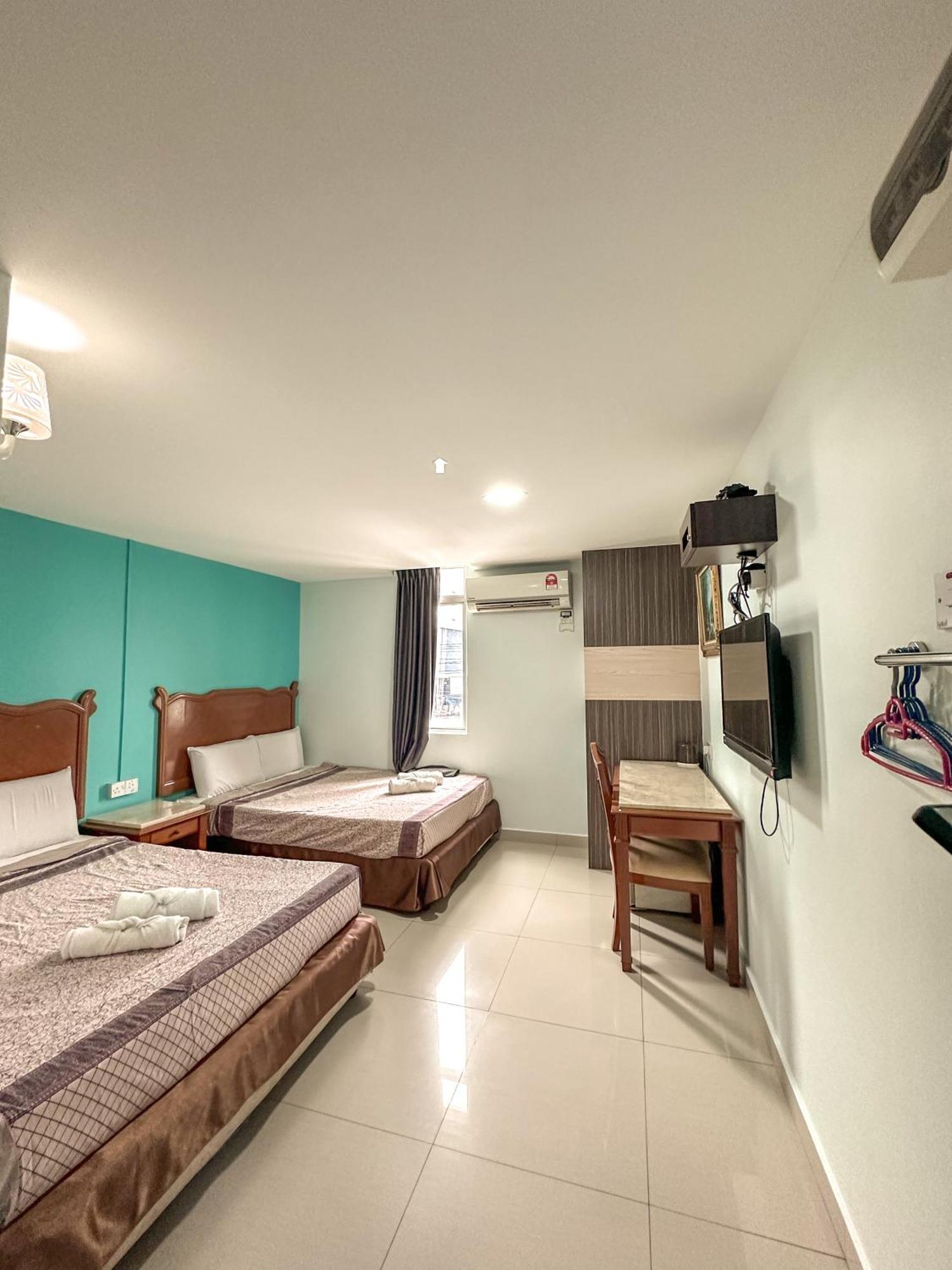 G Star Hotel Pantai Remis Esterno foto